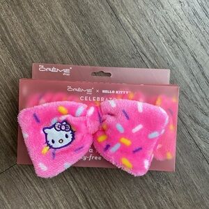 The Crème Shop x Hello Kitty Celebrate Plush Spa Teddy Headband in hot pink